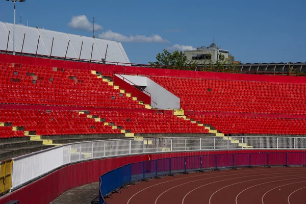 Assentos vermelhos no estádio — Fotografia de Stock