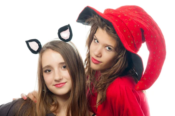 Adolescentes vestidas con disfraces para Halloween aisladas en blanco —  Fotos de Stock