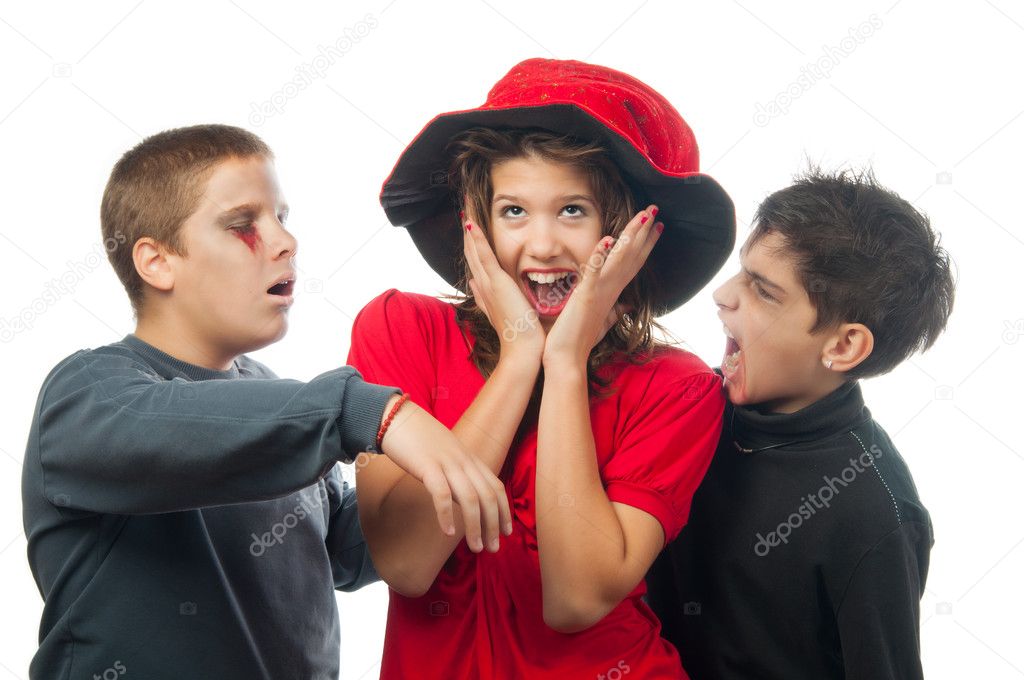 Teenagers dressed in costumes for halloween isolated on white