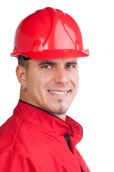 Retrato de joven bombero sonriente con sombrero duro y en uniforme completo aislado en blanco —  Fotos de Stock