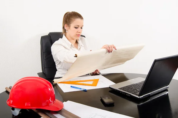 Young female architect working on the project in her office. — Stock Photo, Image