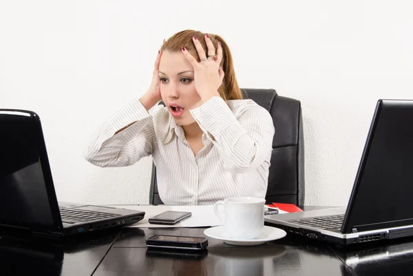 Surprised business woman multitasking — Stock Photo, Image