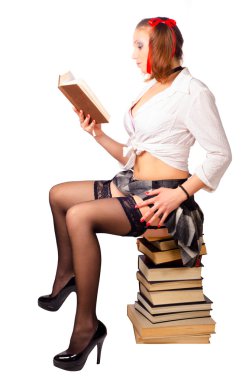 ve okuma kitapları oturan seksi kız öğrenci