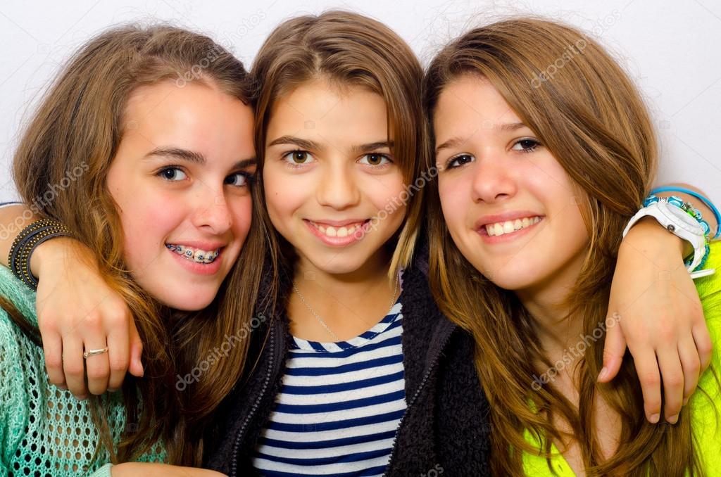 Three happy teenage girls