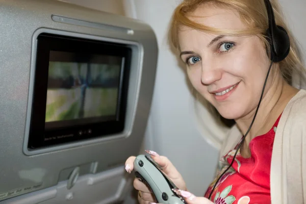 Mujer en un avión —  Fotos de Stock