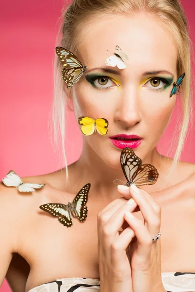 Beautiful woman with butterflies — Stock Photo, Image