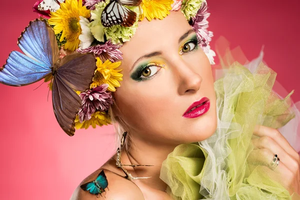 Beautiful woman with butterflies — Stock Photo, Image