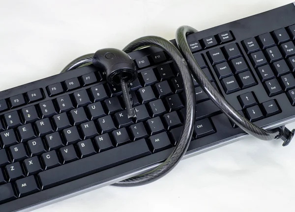 Keyboard and chains — Stock Photo, Image