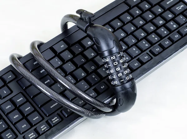 Keyboard and chains — Stock Photo, Image