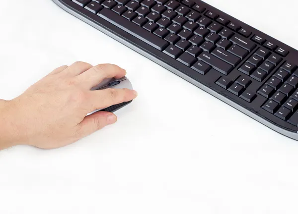 Mão segurando mouse computador — Fotografia de Stock