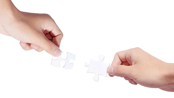 Hände und Puzzle — Stockfoto