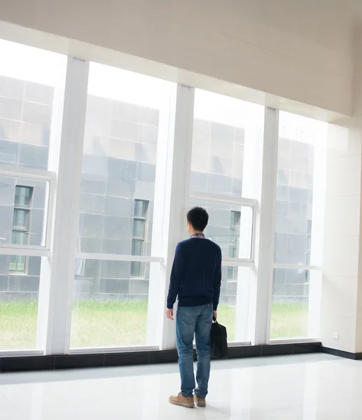 Man standing in the hall — Stock Photo, Image
