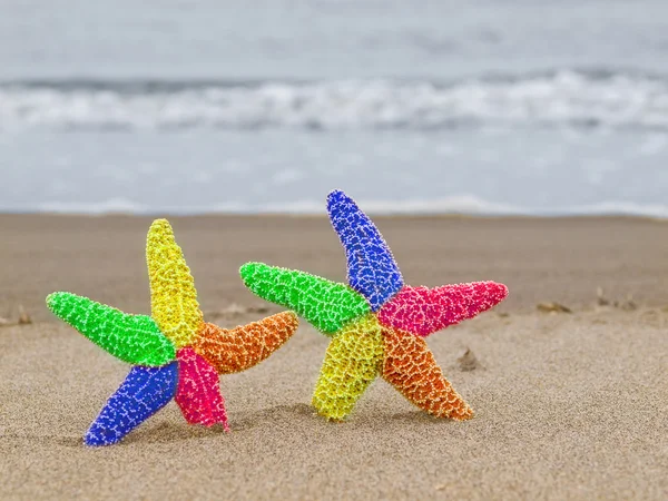 Két szivárvány csillag a partvonal — Stock Fotó