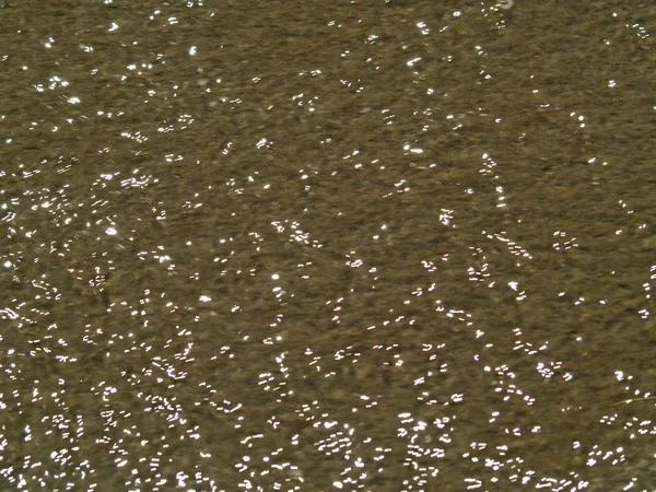 Абстрактный фактурный фон океанских рябчиков на пляже — стоковое фото