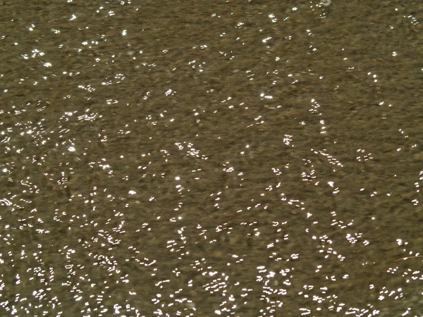 Textura abstrata Fundo das ondulações oceânicas na praia — Fotografia de Stock