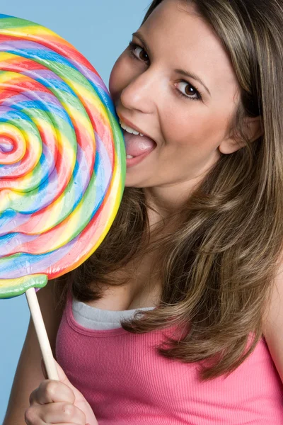 Meisje likken lolly — Stockfoto