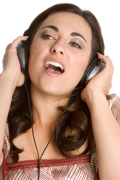 Menina ouvir música em fones de ouvido e cantando — Fotografia de Stock