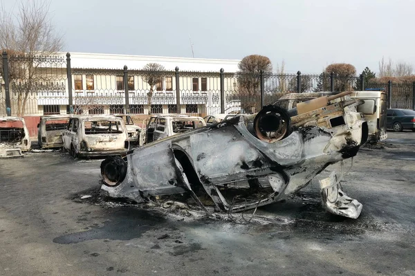 Taraz, Kazakhstan - January 7, 2022 - Burnt out cars after protests and unrest in Kazakhstan