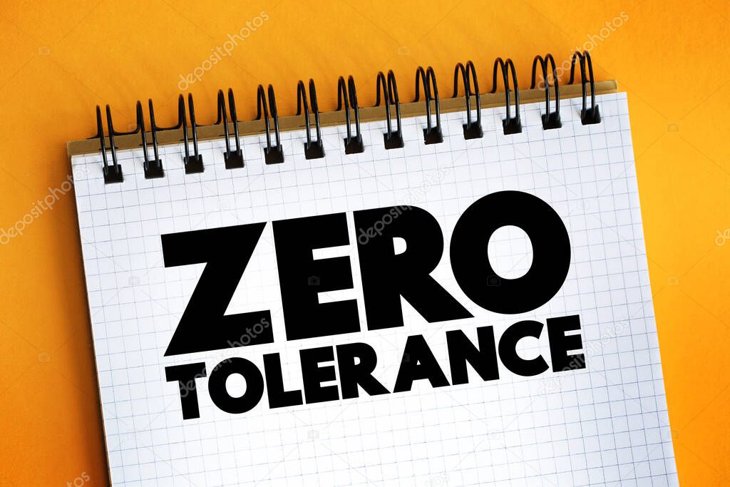 Zero Tolerance text on notepad, concept backgroun