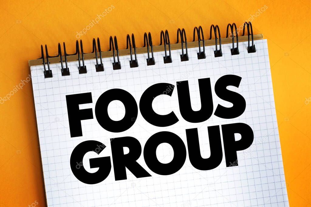 Focus Group text on notepad, concept background