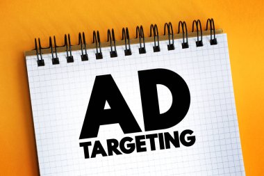 Ad Targeting - form of advertising, that is directed towards an audience with certain traits, text concept on notepad clipart