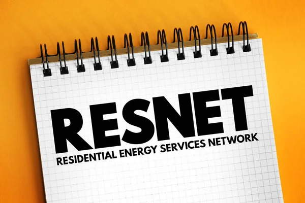 RESNET - Residential Energy Services Network acronym text on notepad, abbreviation concept background