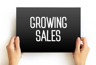 Growing Sales text on card, business concept background