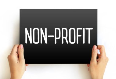 Non Profit - organizations do not earn profits for their owners, text concept on card