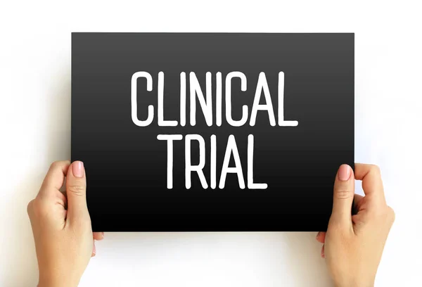 Clinical Trial - research studies performed in people that are aimed at evaluating a medical, surgical, or behavioral intervention, text concept on card