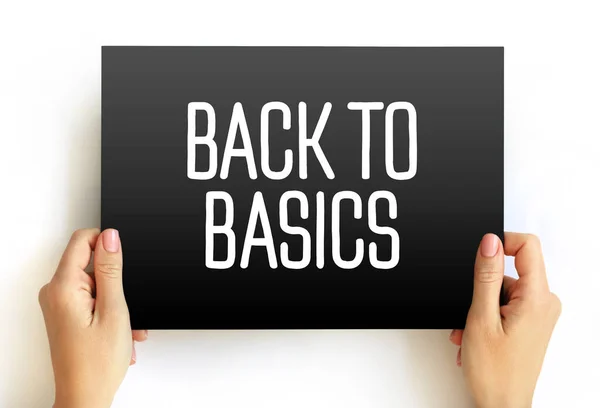 Back to Basics - return to a simpler way of doing something or thinking about something, text concept on card