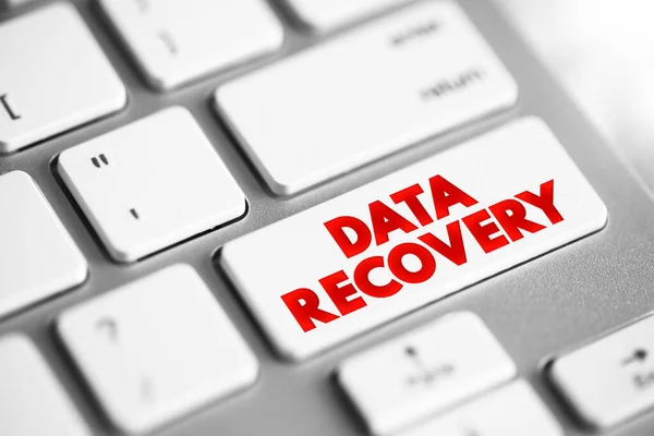 Data recovery - process of salvaging deleted, lost, corrupted, damaged or formatted data from removable media or files, text concept button on keyboard