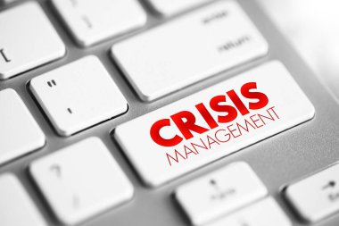 Crisis management - process by which an organization deals with a disruptive and unexpected event that threatens to harm the organization or its stakeholders, text button on keyboard
