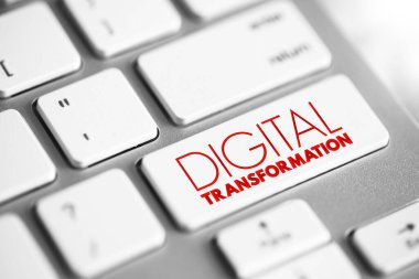 Digital transformation - adoption of digital technology by a company, text button on keyboard