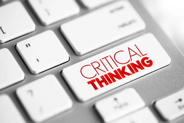 Critical thinking - analysis of facts to form a judgment, text button on keyboard