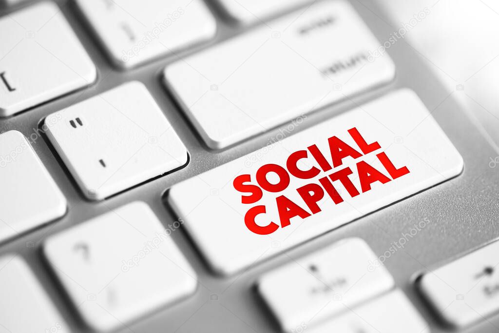 Social Capital - networks of relationships among people who live and work in a particular society, enabling that society to function effectively, text concept button on keyboard