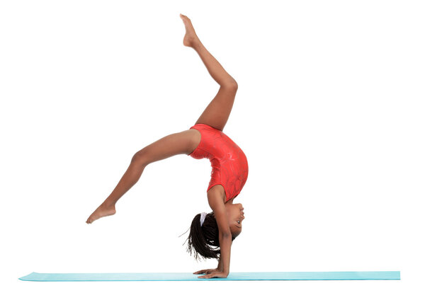 Young girl doing gymnastics with motion blur