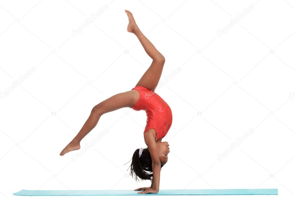 Young girl doing gymnastics with motion blur