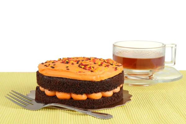 Halloween chocolate orange cake with tea — Stock Photo, Image