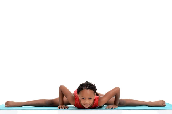 Young girl doing gymnastics front split — Stock Photo, Image