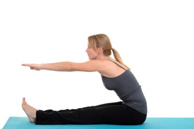 genç bir kadın tarafından Yoga pose
