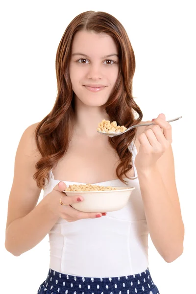 Menina adolescente comendo cereais — Fotografia de Stock