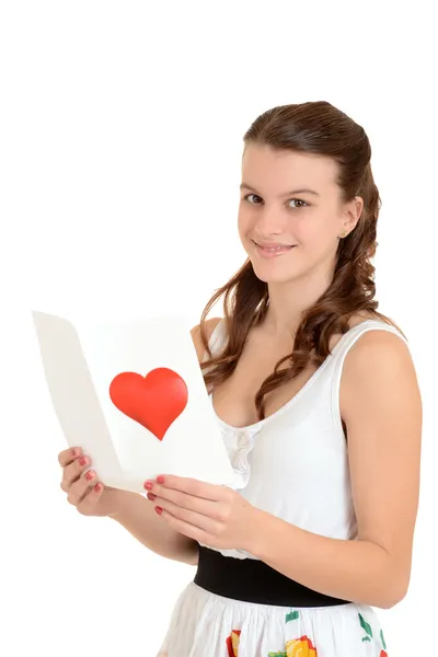 Lycklig tonåring tjej med valentines kort — Stockfoto
