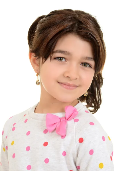 Romanian child wearing pink ribbon bow Stock Picture