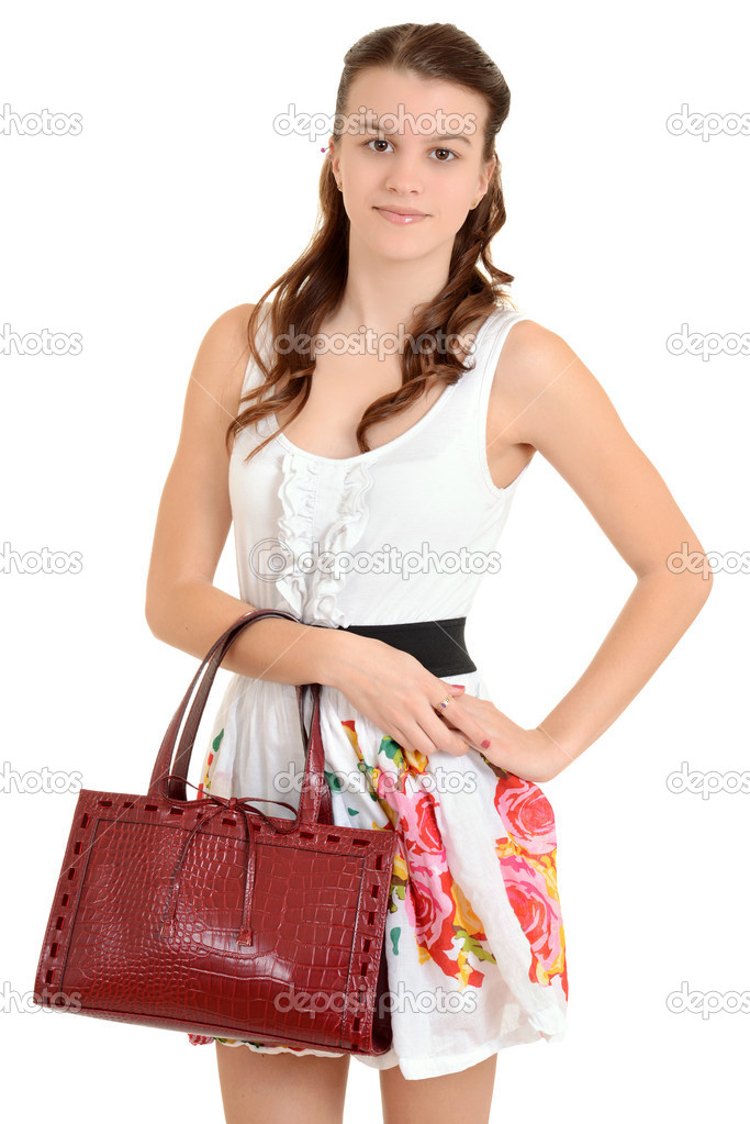 Premium Photo | Poor woman holding purse with coins on white background