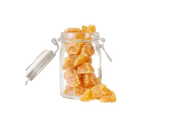 Isolated candied ginger in a jar — Stock Photo, Image