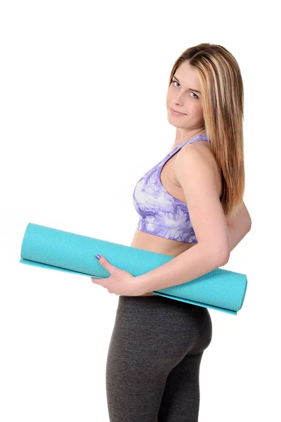 Teen girl holding exercise mat — Stock Photo, Image