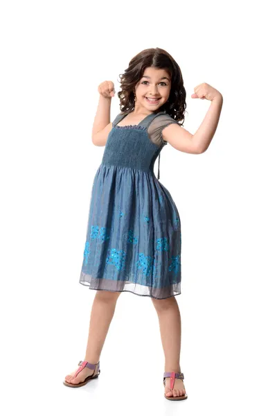 Little girl doing muscle pose — Stock Photo, Image