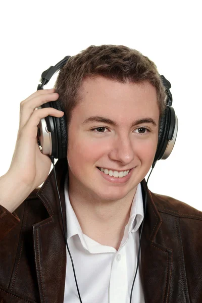 Teenager-Junge hört Musik mit Kopfhörern — Stockfoto
