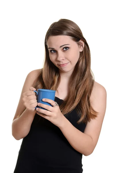 Menina adolescente segurando uma xícara de café — Fotografia de Stock