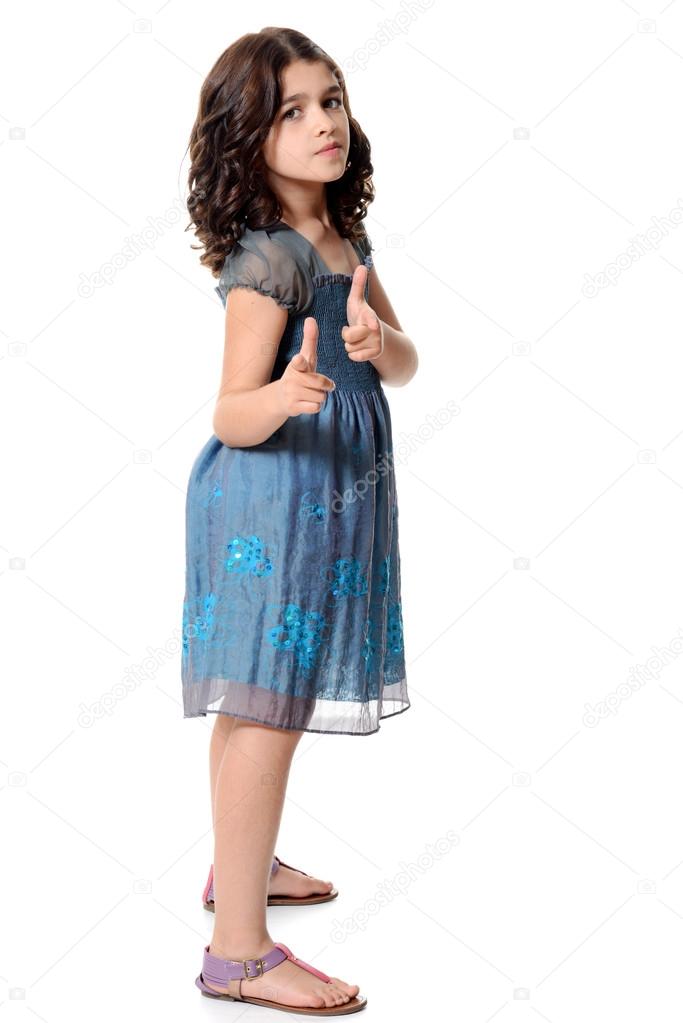 Little girl making hand gesture